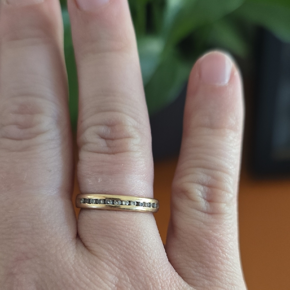 Elegant Gold Band with Embedded Stones